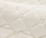 tissu ivoire matelassé